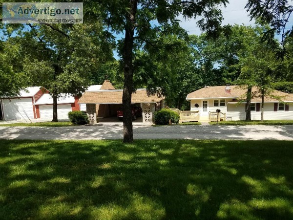 Lake Ozark waterfront home with 2 large outbuildings