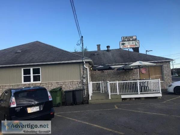 Building with bar and 5 video poker machines for sale Drummondvi