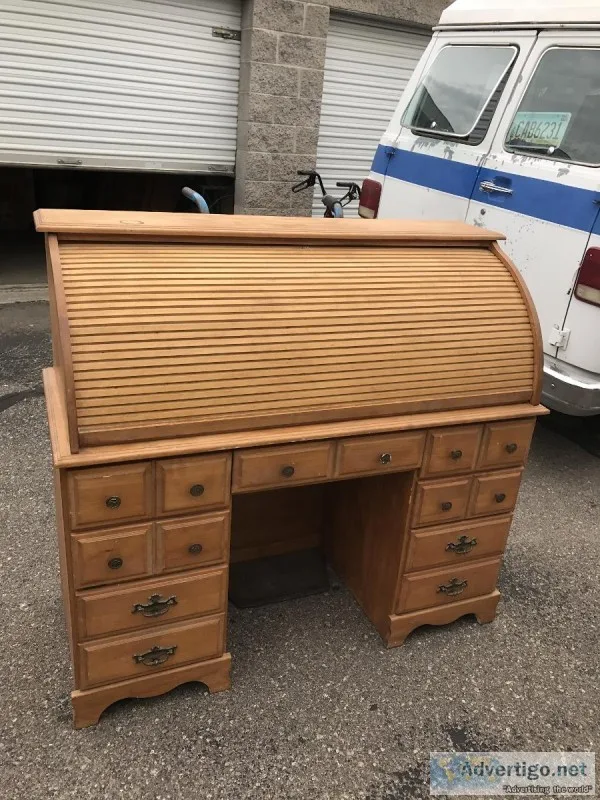 Cherished wood roll top desk for sale