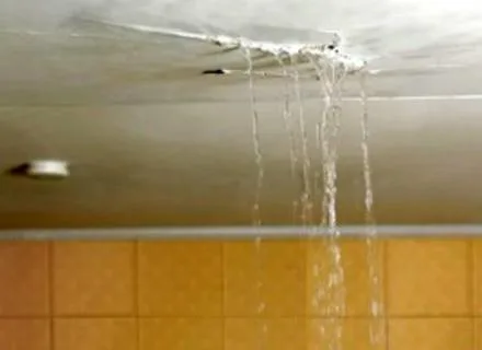 Upstairs bathroom flooded leaking through ceiling
