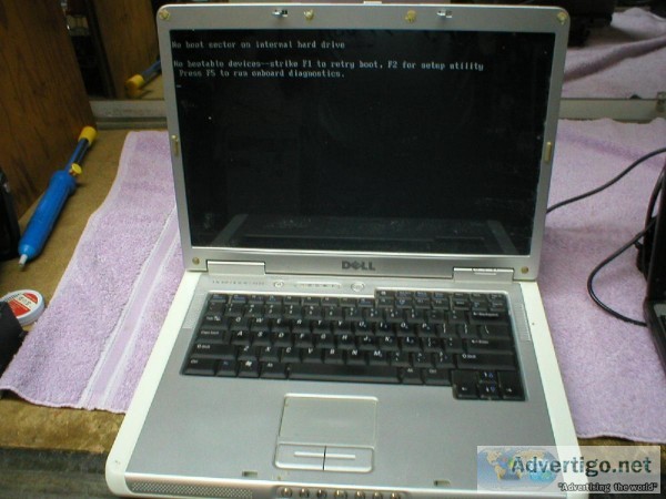 4 OLD LAPTOP COMPUTERS FOR PARTS OR REPAIR AS-IS