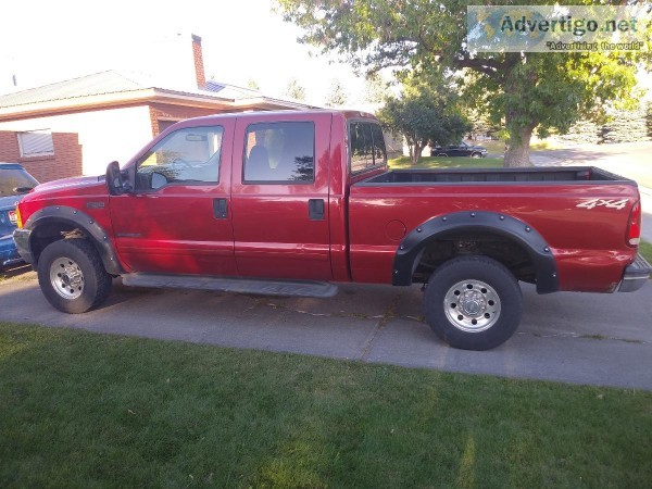 Red Ford Superduty Powerstroke Diesel v8 7.3 L