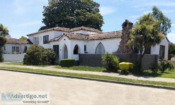 Grand Tri-level Spanish Style Duplex
