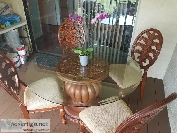 Tropical wood dining table and 4 chairs 60in round