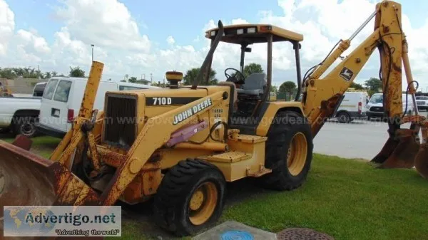 1996 John Deere 710D backhoe front loader