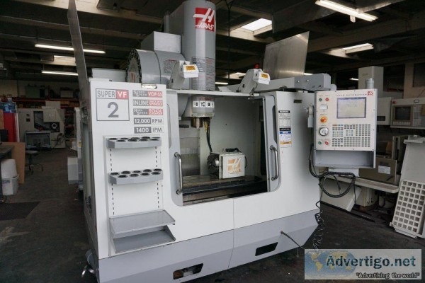 HAAS VF-2SS CNC 4-Axis Vertical Machining Center loaded with fea