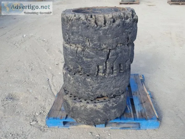 (4) RIMS WSOLID TIRES fits skidsteer