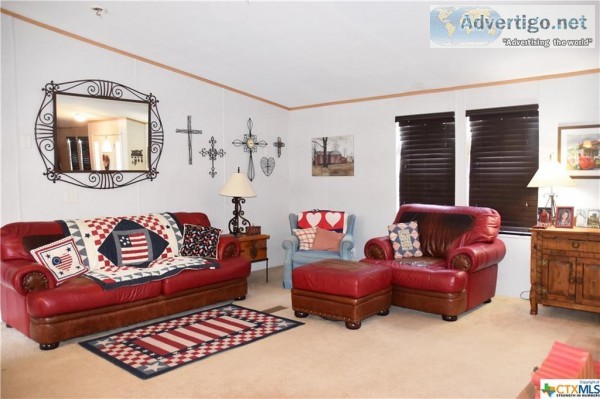 Price Reduced on this well-kept double-wide manufactured home on