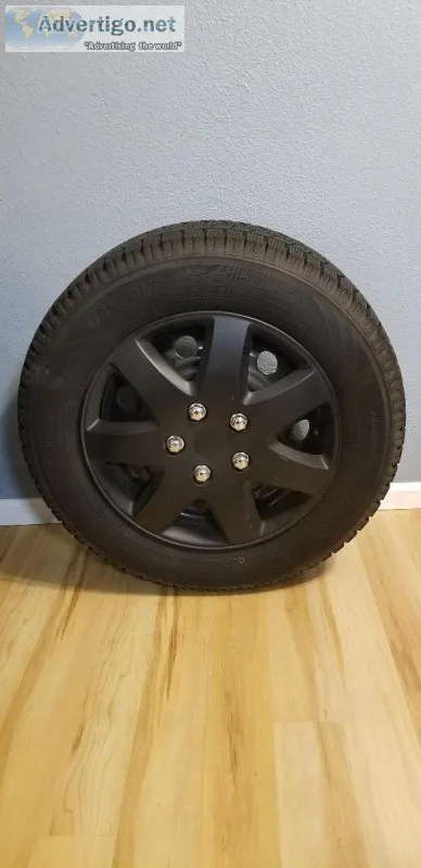 Toyo Snow Tires on Rims and Hubcaps (4x)