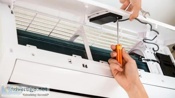 Open up the AC for repair by AC repair North Miami