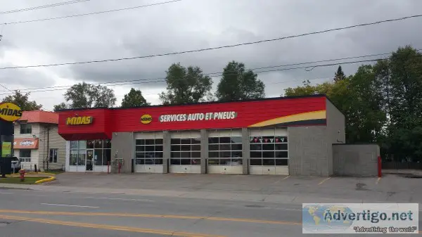 In Laval Commercial building and Midas franchise for sale