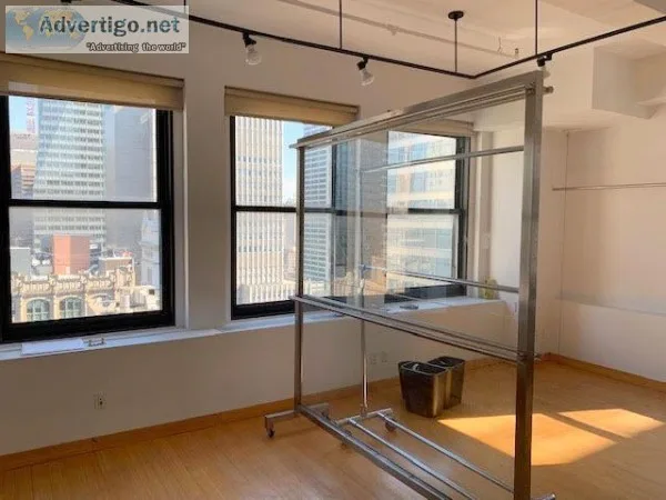 Bright sunny space on a high floor with open city views.
