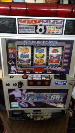 red and blue 7 slot machine. - 200 (mounds view)