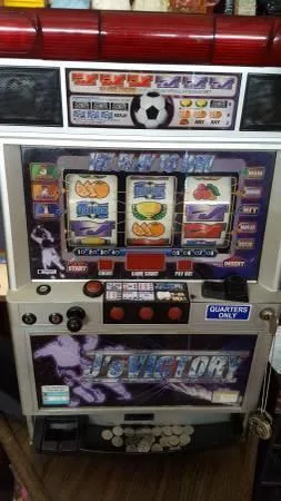 red and blue 7 slot machine. - 250 (mounds view)