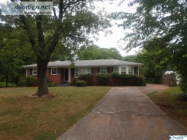 Charming full brick 3 bedroom 2 bath home with a bonus room