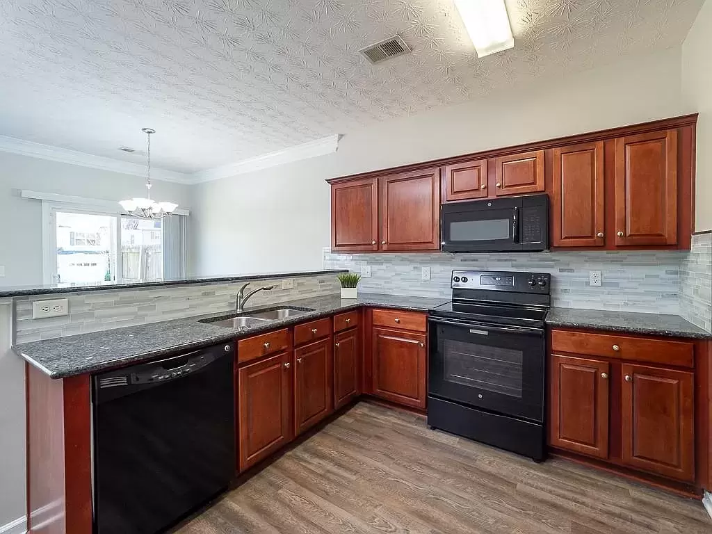 Impeccably maintained home with new laminate flooring