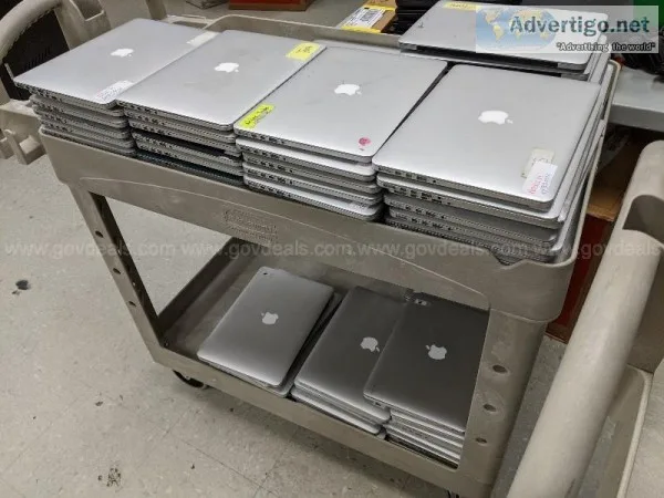 Lot of Macbooks in various conditions.