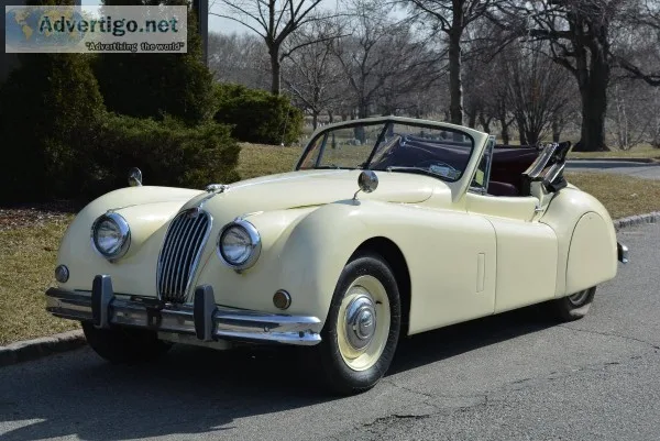 20128 1959 Jaguar XK140 DHC