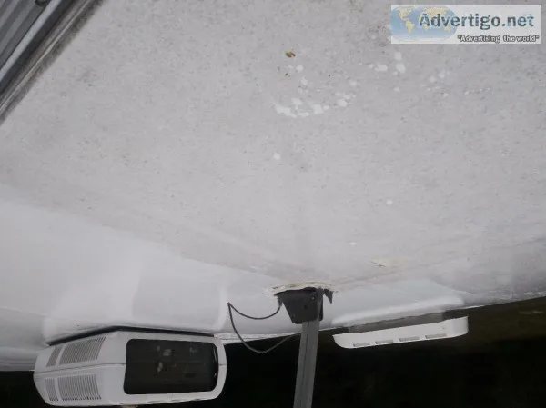 RV- Rubber Roof Coatings.
