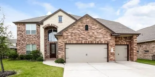 This gorgeous home features wood-style and carpet flooring throu