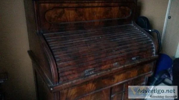 Antique roll top desk