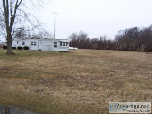   COUNTRY 1 ACRE LOT WITH MOBILE HOME AND GARAGE 