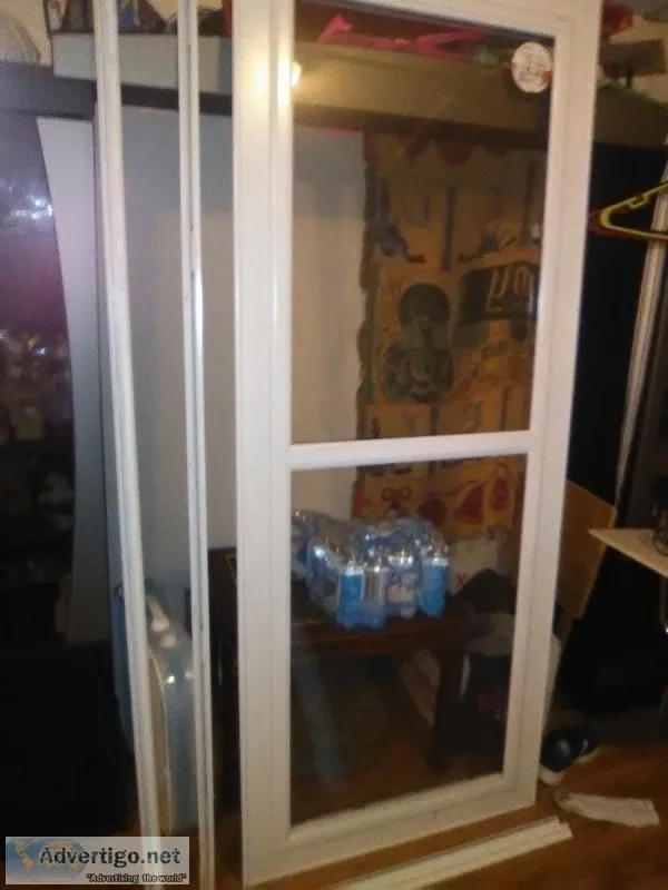 Larson storm door with lock and key