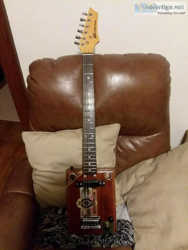 Custom made cigar box guitar mojo included