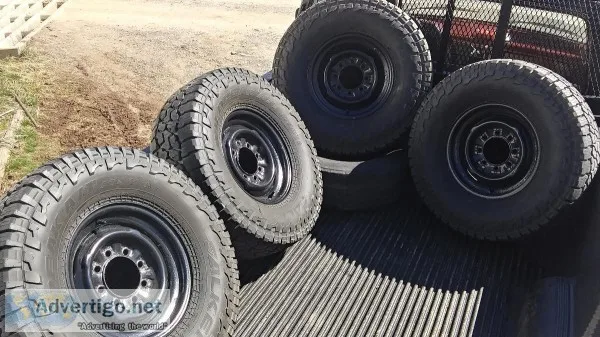 Set of 4 tires already mounted and balanced on steel wheels.