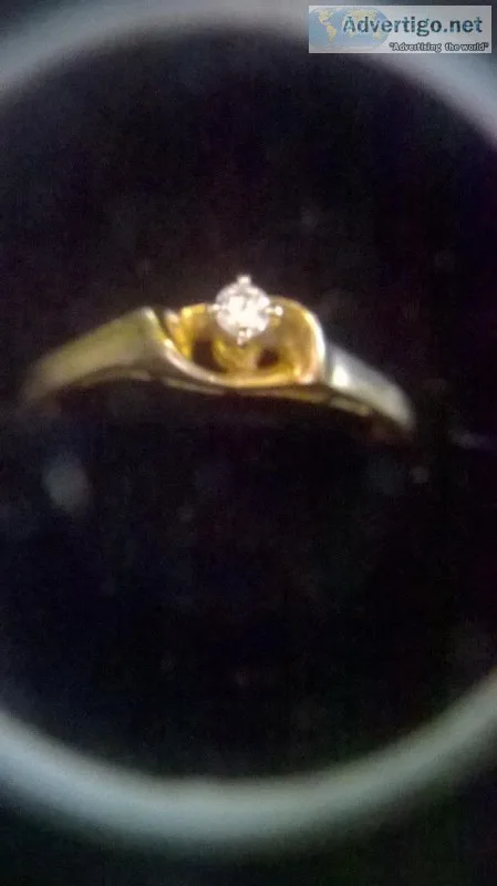 Solid 10K Solitaire diamond ring.