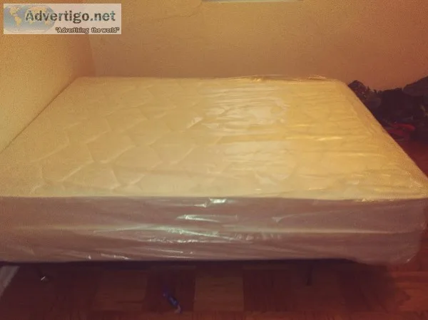 Full size bed boxspring and frame. Brand new in plastic
