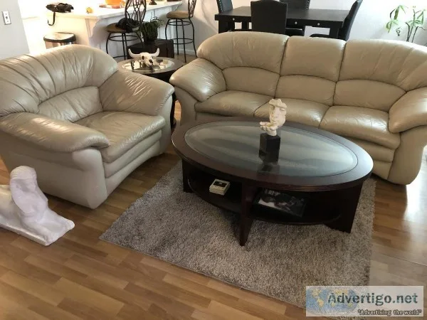 Tan leather sofa and chair plus