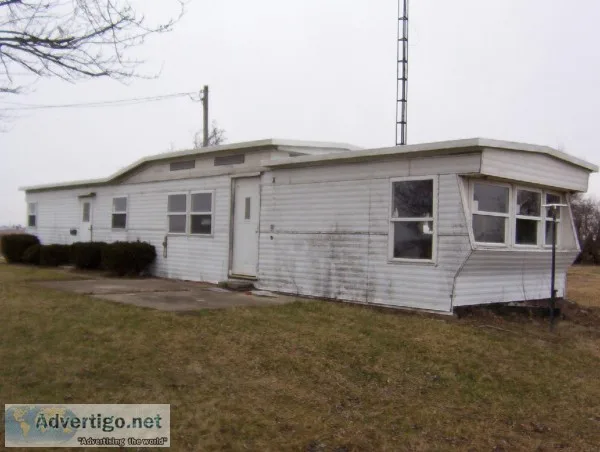    FREE MOBILE HOME WITH PURCHUSE OF 2 CAR GARAGE and ONE ACRE O