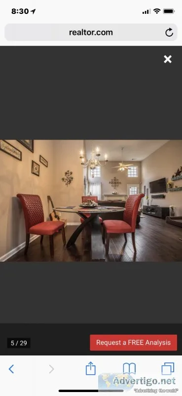 Glass top table and 4 red chairs