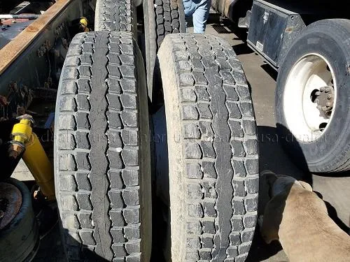 RECAP TIRE AND RIM 11R22.5