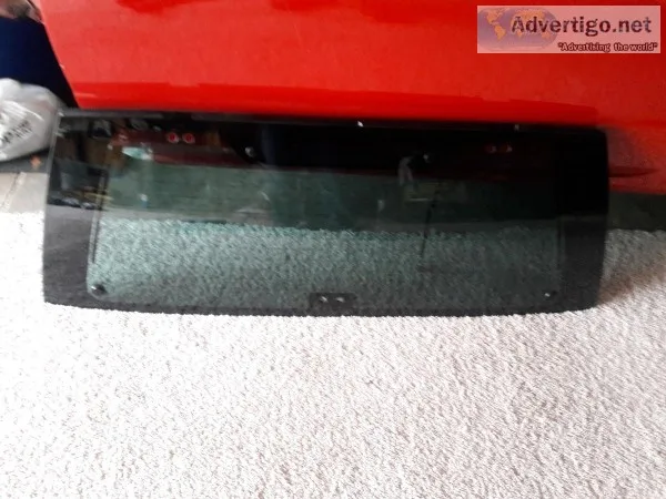 2004 nissan pathfinder tail gate window complate oem