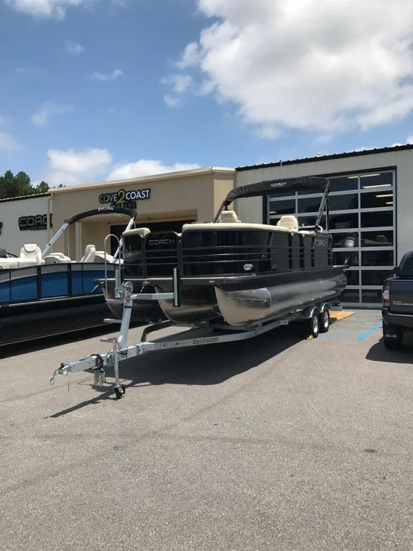2017 Coach 23 RF Tritoon wHonda 250 and Magic Tilt trailer w bra