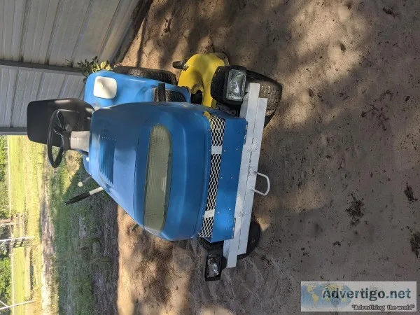 Lawn mowerCorta Pasto Sentado en Ella
