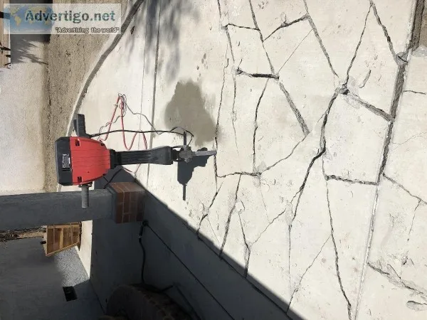 Concrete demolition and dirt removal.