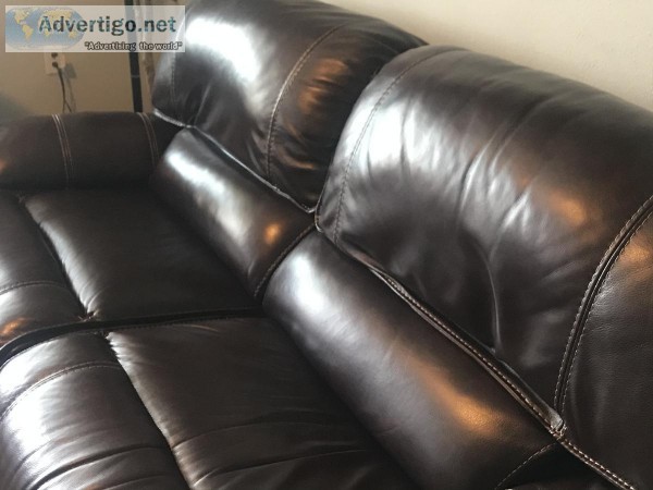 Powered and reclining leather sofa and recliner