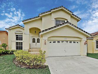 Luxurious home features beautiful granite counter tops and plent