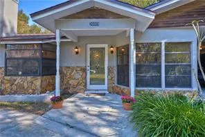Enjoy the peaceful and private feel of Olde Florida style living