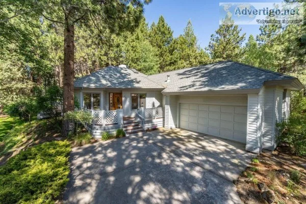 Fantastic single level home on a large with large wood-framed wi