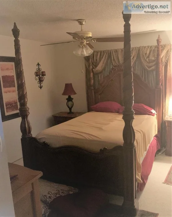 Queen poster bed all wood