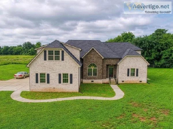 Beautiful All Brick Home situated on more than 2 acres of privat