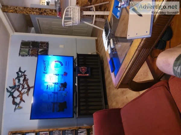 Bar stools and speakers and tv