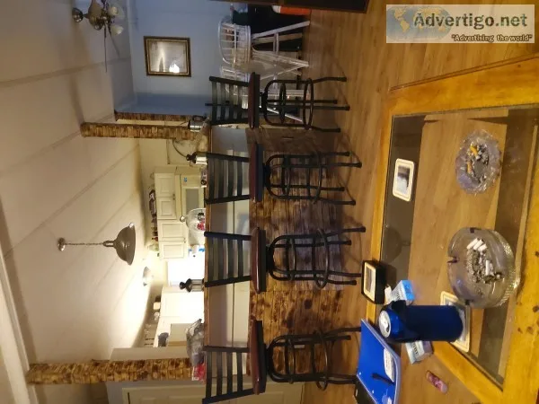 Bar stools and speakers and tv