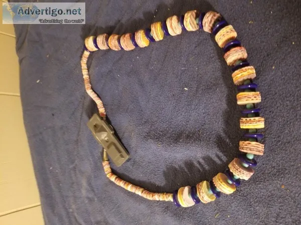 Necklace round with anti theft clip.