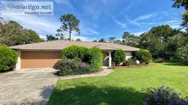 NICELY LANDSCAPED IN THE FRONT AND BACK YARD. INSDE LAUNDRY SURR