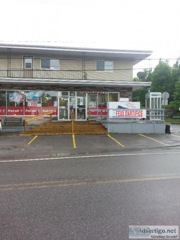 Semi-commercial bullding with convenience store and large apartm